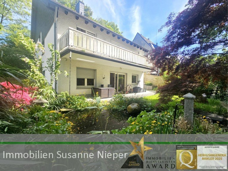 Hausansicht hinten Solingen Einfamilienhaus Besonderes Wohngef�hl im Split-Level-Stil. Freistehendes Einfamilienhaus mit Einliegerwohnung in ruhiger Wohnlage