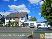 Hauptbild Vielfältige Nutzungsmöglichkeiten. Beziehbares 2-Familienhaus mit vermieteten Betriebsgebäude in Solingen Aufderhöhe