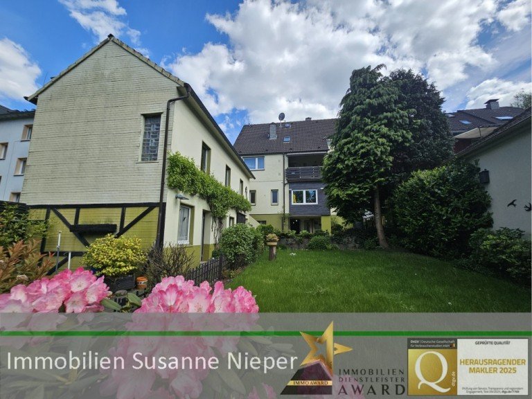 Au�enansicht Solingen Mehrfamilienhaus Vielseitig nutzbare Liegenschaft - Attraktives Mehrfamilienhaus mit Garten und separatem Gewerbehaus