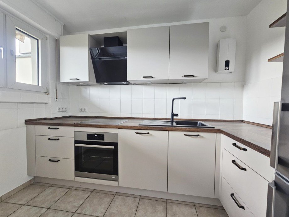 Lichthelle Erdgeschosswohnung mit XXL-Balkon und Einbauküche an der Stadtgrenze zu Haan und Hilden - Photo 2