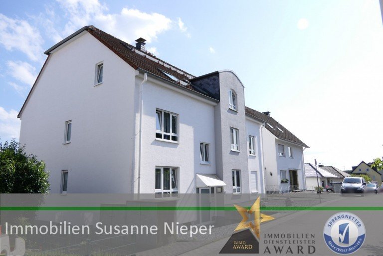 Au�enansicht Solingen Maisonettewohnung Zukunftsinvestition - vermietete Maisonettewohnung mit Dachterrasse und Garage als Kapitalanlage